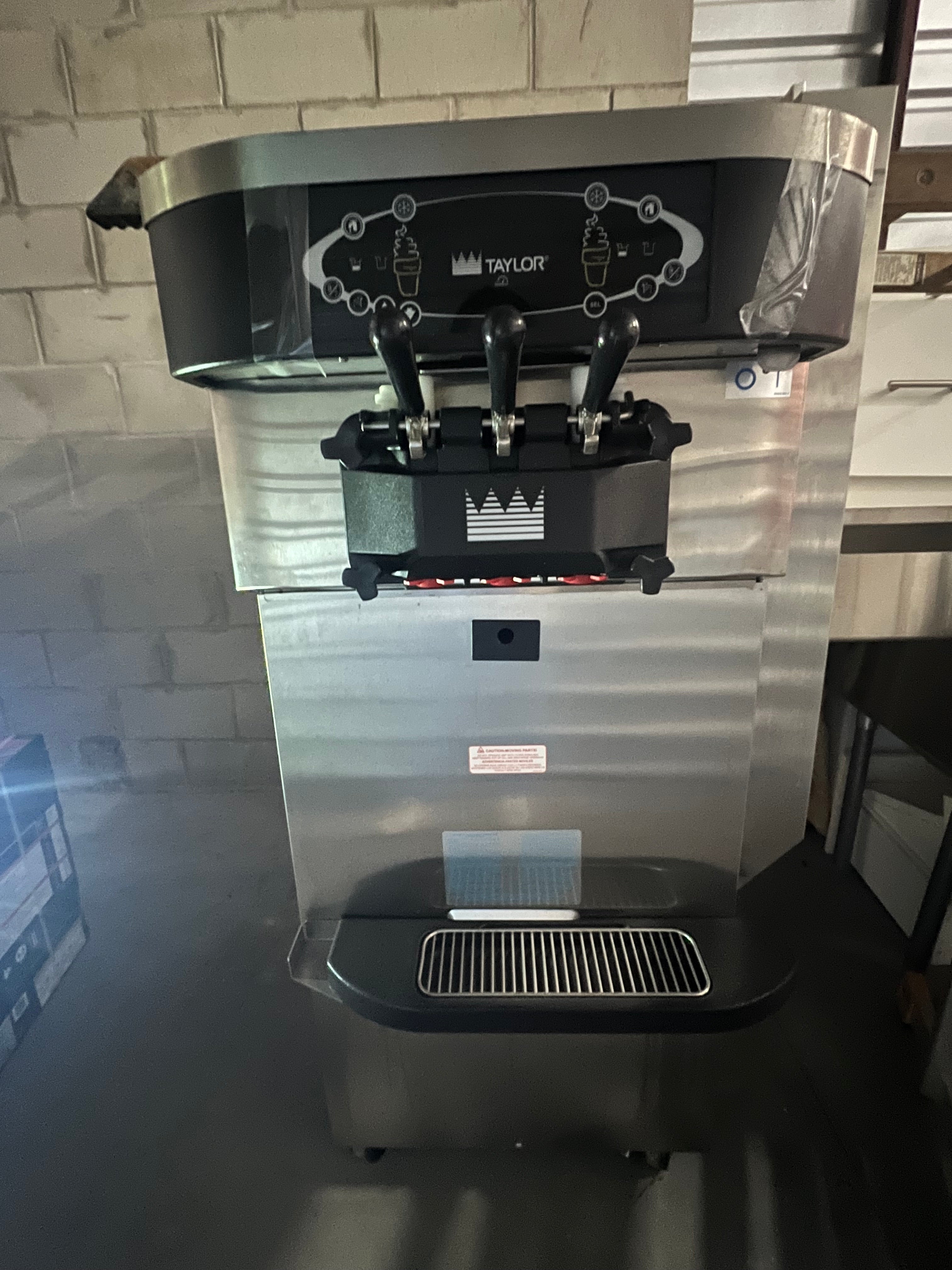 Package with 3 (three) 2012 Taylor C723 3ph air with Master-bilt DD-46L dip cabinet and a Deerfield drop in bar for refrigerated toppings.
